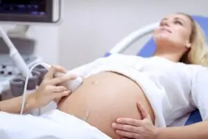 Woman at her 3rd trimester prenatal appointment. 